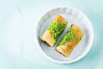 Multicolored baklava, Oriental sweetness on a plate