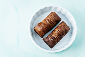 Multicolored baklava, Oriental sweetness on a plate