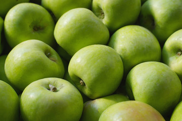 green apples on black background