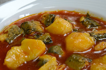 National Spanish cuisine of Valencia. Unique delicious Allipebre dish. Freshwater eel from Lake Albufera stewed with potatoes. Travel to Valencia.