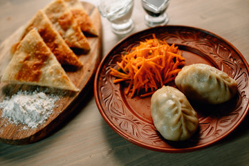 Mongolian traditional food on wood desk