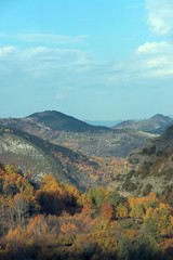 Naklejka premium Colorful autumn landscape in the mountain village. 