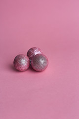 Christmas decorations on pink background. Flat lay, top view, copy space