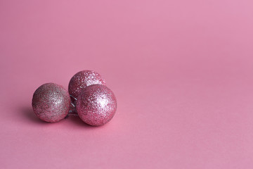 Christmas decorations on pink background. Flat lay, top view, copy space