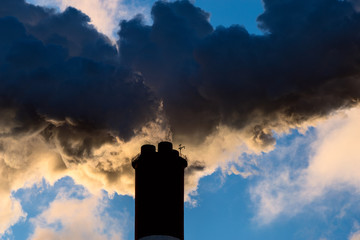 Air pollution from a pipe of an industrial plant.