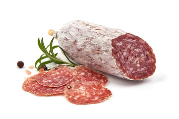 Traditional Spanish Fuet thin dried sausage, isolated on white background