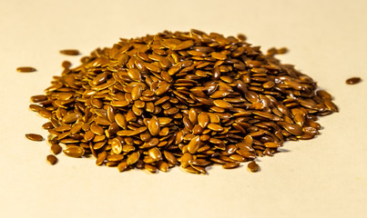 item a macro photo of dry seeds of flax. healthy diet.