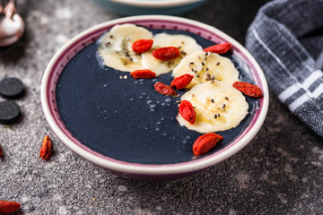 Black charcoal smoothie with goji