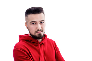 Handsome man in red casual clothes posing isolated on white background