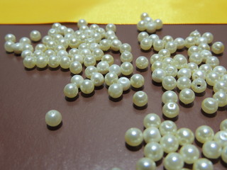 pearl necklace on white background