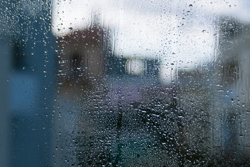 Window glass with drops and shapes