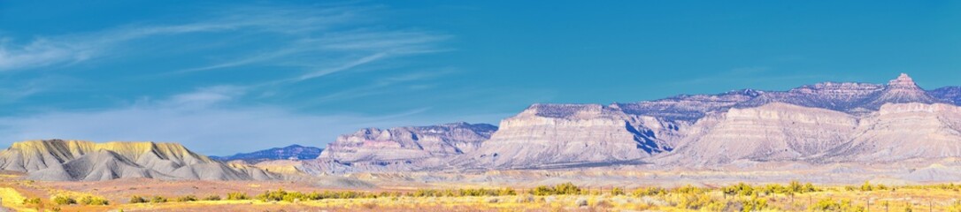 Moab Panorama views of desert mountain ranges along Highway 191 in Utah between Moab and Price in fall. Scenic nature near Canyonlands and Arches  National Park. United States of America. USA.