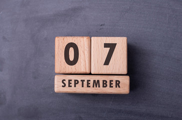September 7 written with wooden blocks