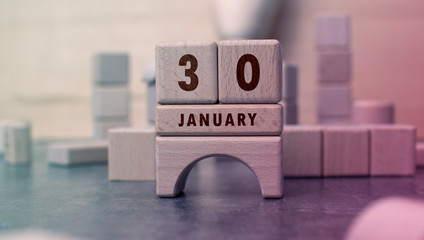 January 30 written with wooden blocks