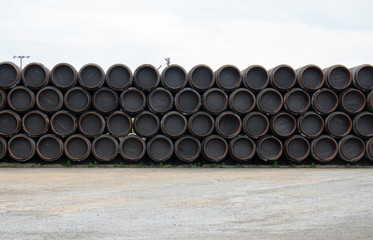 huge warehouse of pipes for pipeline construction