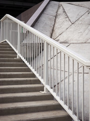 Stairs lines railing cement concrete white grey