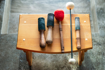 wooden sticks for sound therapy with singing bowls