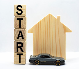 cubes with the word start and a house on a white background