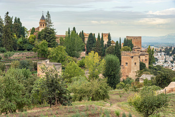 Fototapeta na wymiar Panoramic view of Alhambra palace, Granada, Spain. Majestic grand view of the impressive palace of the Alhambra complex