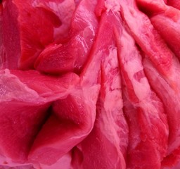 Fresh pork meat lies on the table