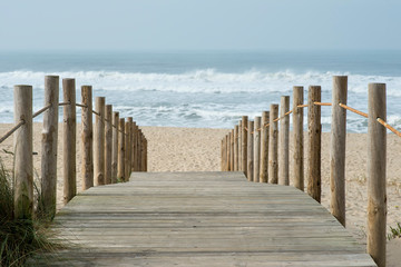 wooden walkway to access the beach of Esmoriz in Portugal