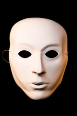 white mask on black background