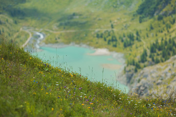 Beautiful view of the spring landscape on the reservoir and the river in the Alps. Austria