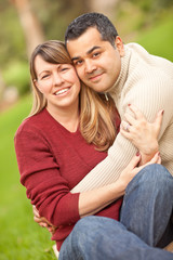 Fototapeta premium Attractive Mixed Race Couple Portrait in the Park
