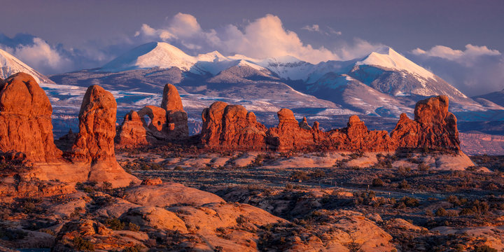 FEBRUARY 15, 2019 -  ARCHES NATIONAL PARK, UTAH , USA - Arches National Park, Utah at sunset - Lasalle Mountains in distance