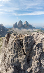 Vertical Panorama of the Torre di Toblin (Toblinger Knoten) in front of the Tre Cime di Lavaredo (Drei Zinnen), South Tyrol, Italy
