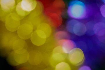 BOKEH CHRISTMAS BLURRY AND COLOURFUL BACKGROUND, LIGHT LEAK WITH LENS FLARES