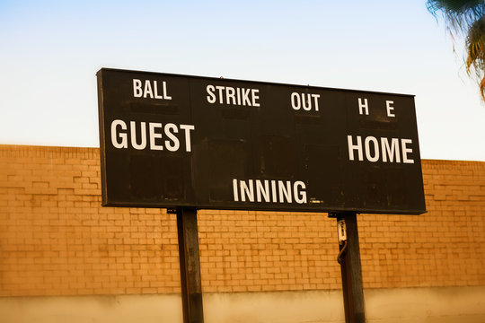 An old fashioned baseball or softball scoreboard without any scores to display.