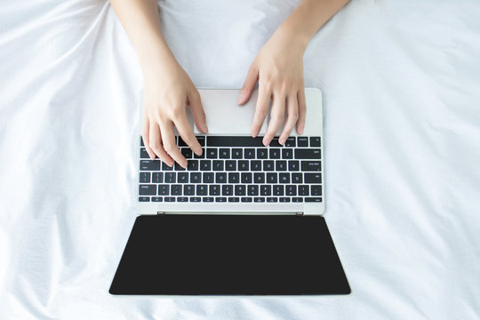 Girl Working At Home, Woman Typing On Laptop, Laptop On Bed.