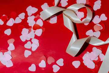 Valentine day concept. Hearts and Ribbon with red background. 
