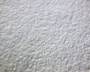 Surface of cold snow. Backdrop for Winter marketing tasks. White frosty background.