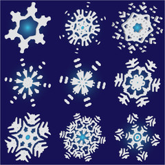 Collection of cute snowflakes on blue background.