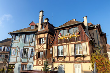 Obraz premium Traditional Alsatian half-timbered houses in Petite Venise or little Venice, old town of Colmar, decorated at christmas time, Alsace, France