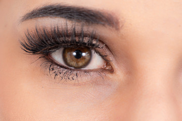 Fototapeta na wymiar Brown woman eye close up