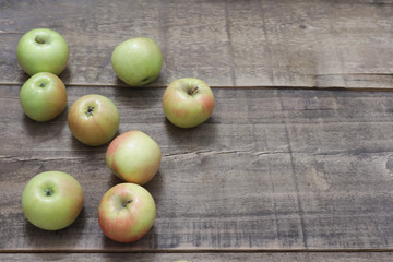apples on wooden table