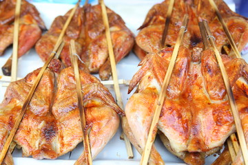 Charcoal baked chicken on sieve