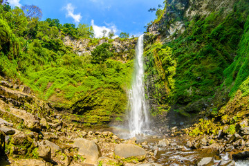 Fototapeta na wymiar Lnadscape view of Coban Rondo waterfall in Pujon, Malang, East Java, Indonesia