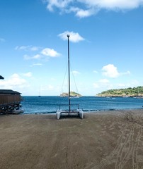 Empty catamaran on the beach