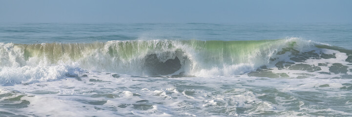 Wave crashing on the shore at Half Moon Bay, California, beautiful beach