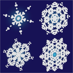 Collection of simple snowflakes on blue background.