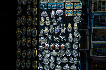 Various decorative objects sold in a souvenirs shop at the bazaar of the Old city of Jerusalem 