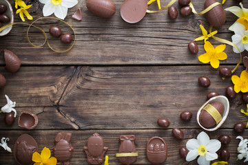 chocolate eggs on dark wooden background