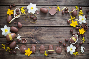 chocolate eggs on dark wooden background