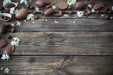 chocolate eggs on dark wooden background