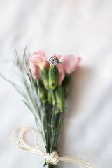 engagement ring on flowers