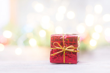 Close up of red gift box for Christmas or New Year decoration background